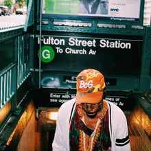 Load image into Gallery viewer, BcG. Signature Orange Camo Hat
