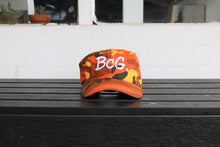 Load image into Gallery viewer, BcG. Signature Orange Camo Hat
