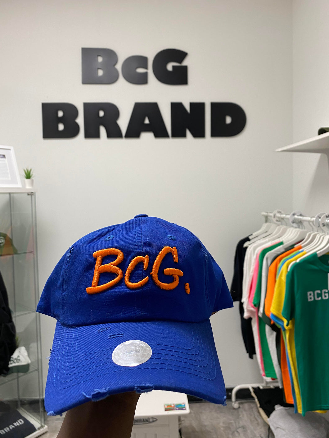 BcG. Signature Blue Hat w/ Orange Logo