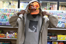 Load image into Gallery viewer, BcG. Signature Orange Camo Hat
